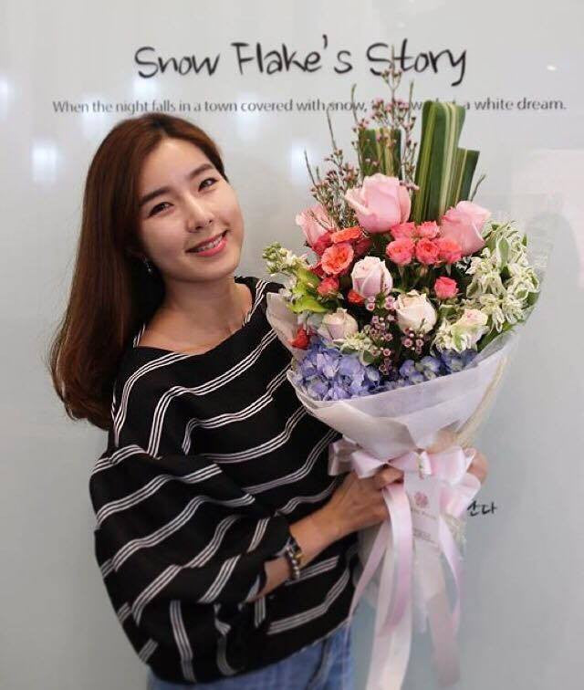 Tall Arrangement With Pink And Spray Roses - April Flora